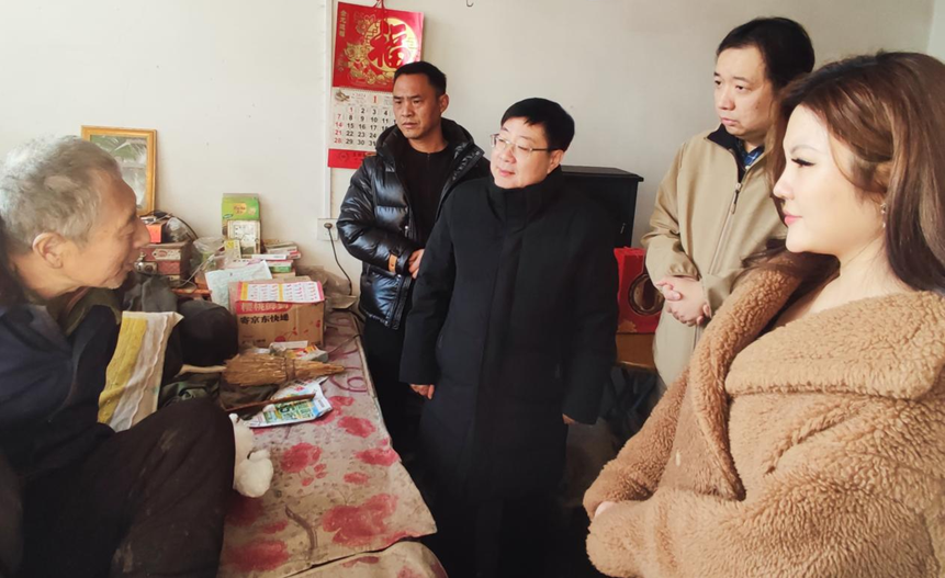 圖為入戶走訪殘疾人家庭